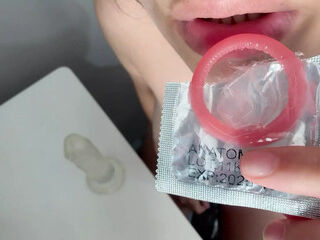 My stepmom showed me how to put a condom on my dick and cum inside it