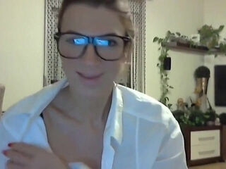 Nerdy MILF sucks and fucks a dildo