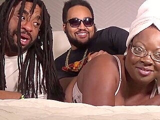 A Black Woman Sucks Two Big Black Cocks