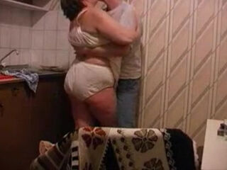 Big grandma get fucked by her boytoy in the kitchen