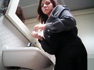 Women pee in public toilet 2259